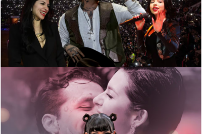 ¡Escándalo total en esta historia ficticia! Nodal se quiebra en pleno concierto y estalla en lágrimas recordando a Cazzu, mientras una supuesta traición imaginada de Ángela Aguilar detona un torbellino de emociones, rumores, tensiones explosivas y secretos nunca antes revelados, atrapando al público en un misterio que sacude por completo este universo narrativo