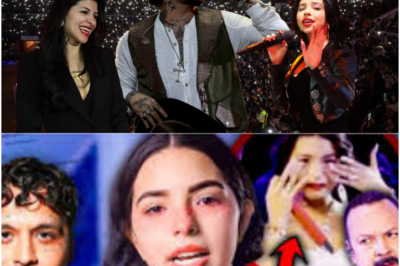 ¡Escándalo total en esta historia ficticia! Nodal se quiebra en pleno concierto y estalla en lágrimas recordando a Cazzu, mientras una supuesta traición imaginada de Ángela Aguilar detona un torbellino de emociones, rumores, tensiones explosivas y secretos nunca antes revelados, atrapando al público en un misterio que sacude por completo este universo narrativo